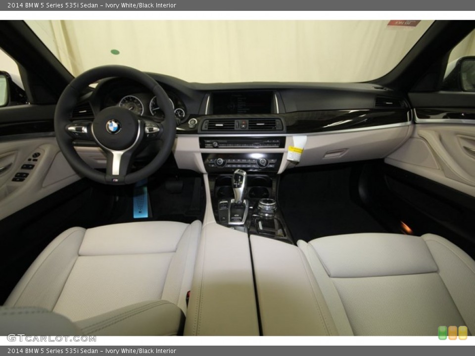 Ivory White/Black Interior Dashboard for the 2014 BMW 5 Series 535i Sedan #84223976