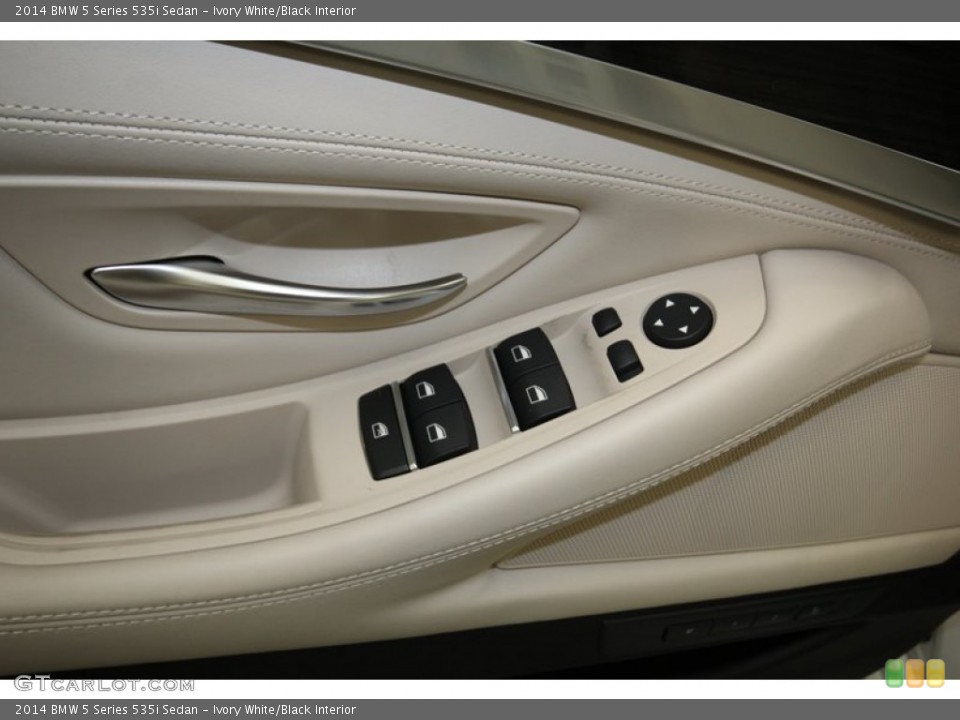 Ivory White/Black Interior Controls for the 2014 BMW 5 Series 535i Sedan #84224171