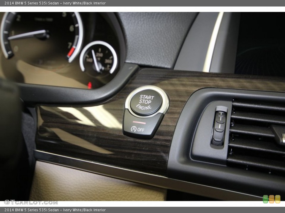 Ivory White/Black Interior Controls for the 2014 BMW 5 Series 535i Sedan #84224453