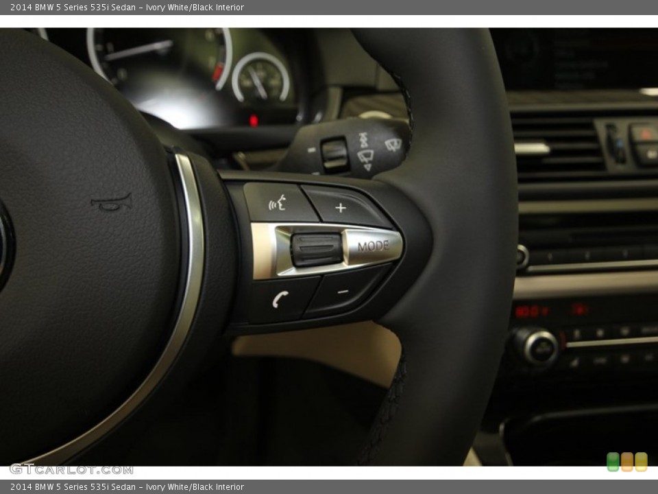 Ivory White/Black Interior Controls for the 2014 BMW 5 Series 535i Sedan #84224471