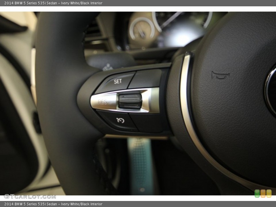 Ivory White/Black Interior Controls for the 2014 BMW 5 Series 535i Sedan #84224495
