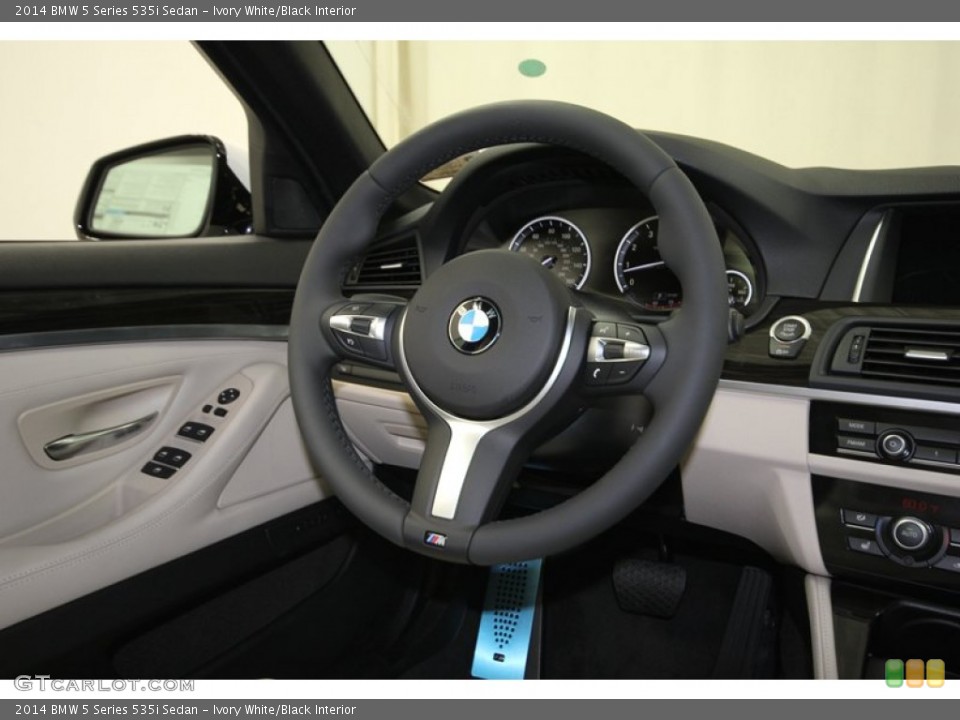 Ivory White/Black Interior Steering Wheel for the 2014 BMW 5 Series 535i Sedan #84224594