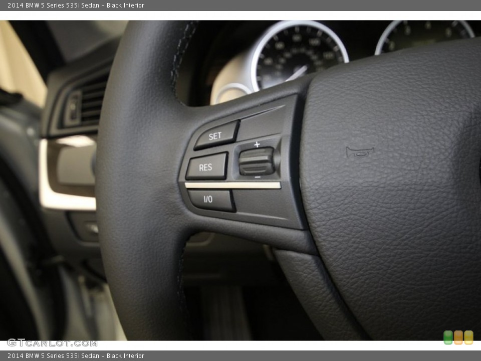 Black Interior Controls for the 2014 BMW 5 Series 535i Sedan #84225332