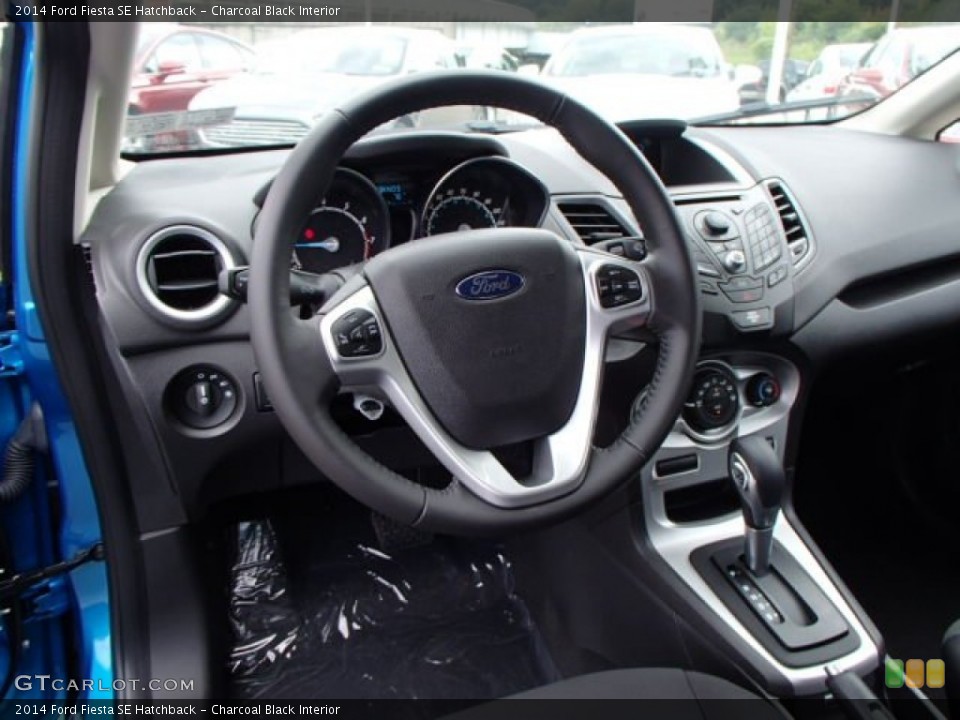 Charcoal Black Interior Steering Wheel for the 2014 Ford Fiesta SE Hatchback #84226718