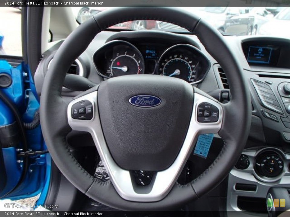 Charcoal Black Interior Steering Wheel for the 2014 Ford Fiesta SE Hatchback #84226829