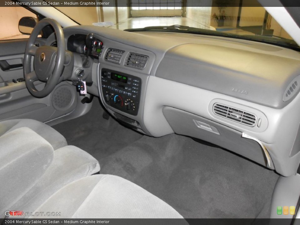 Medium Graphite Interior Dashboard for the 2004 Mercury Sable GS Sedan #84319638