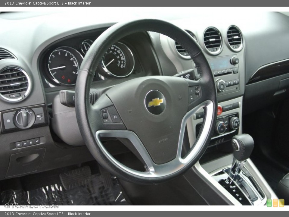 Black Interior Steering Wheel for the 2013 Chevrolet Captiva Sport LTZ #84336396