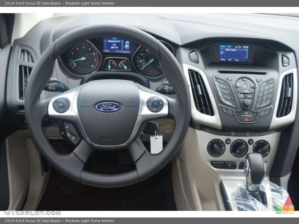 Medium Light Stone Interior Dashboard for the 2014 Ford Focus SE Hatchback #84340331