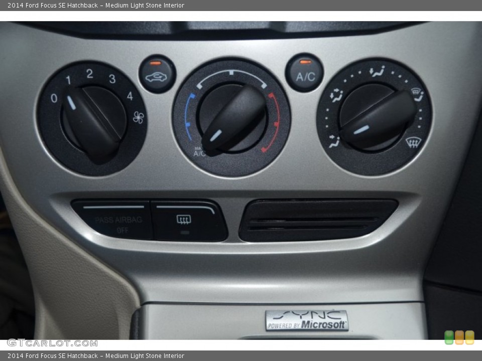 Medium Light Stone Interior Controls for the 2014 Ford Focus SE Hatchback #84340374