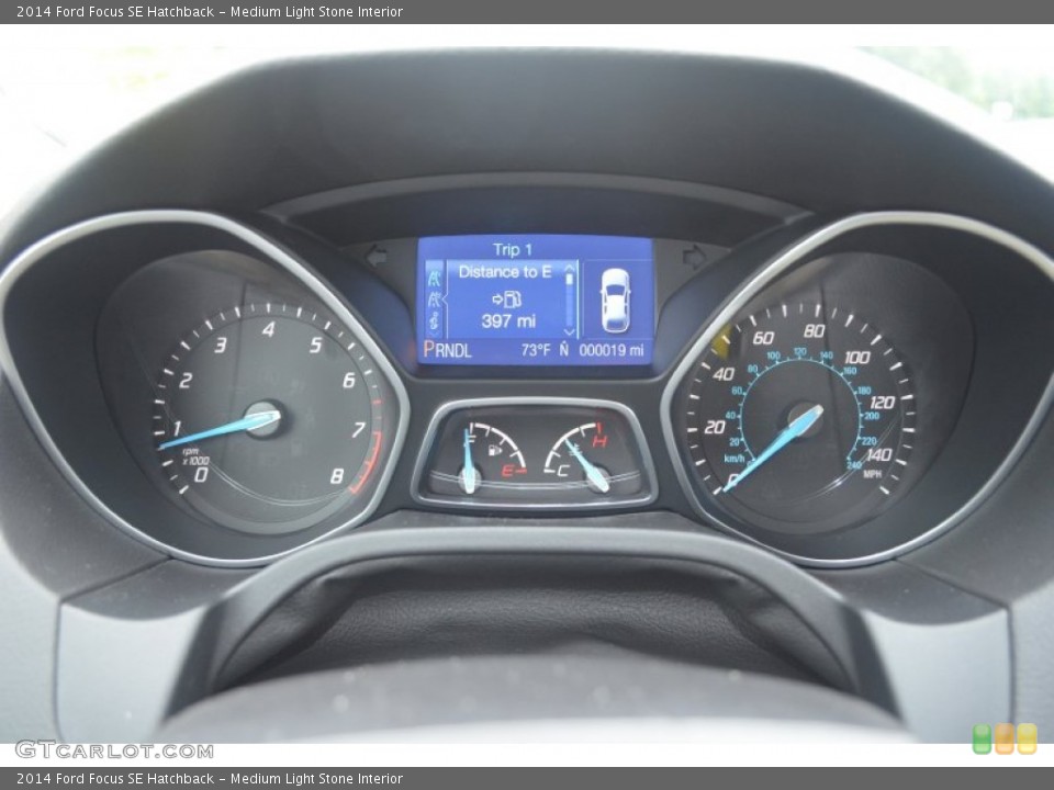 Medium Light Stone Interior Gauges for the 2014 Ford Focus SE Hatchback #84340449