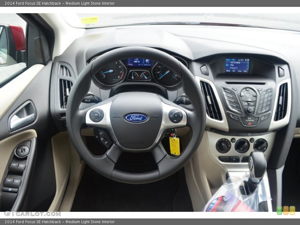 Medium Light Stone Interior Dashboard for the 2014 Ford Focus SE Hatchback #84340776