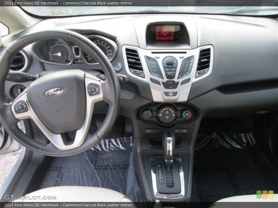 Cashmere/Charcoal Black Leather Interior Dashboard for the 2011 Ford Fiesta SES Hatchback #84396108