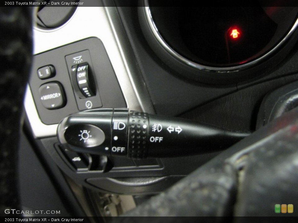 Dark Gray Interior Controls for the 2003 Toyota Matrix XR #84401676
