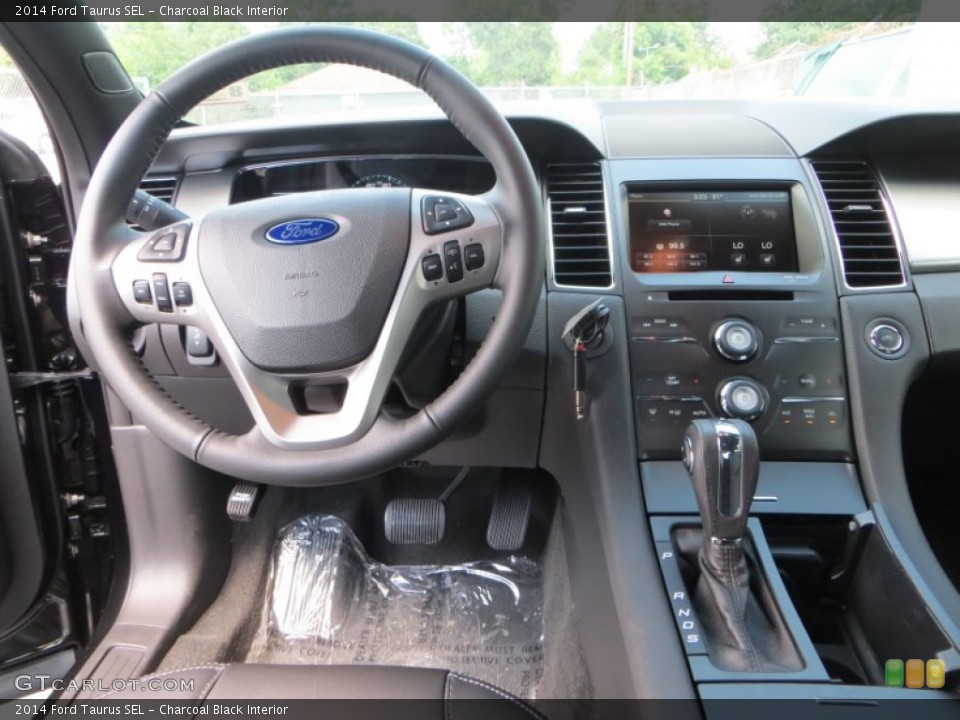Charcoal Black Interior Dashboard for the 2014 Ford Taurus SEL #84437036
