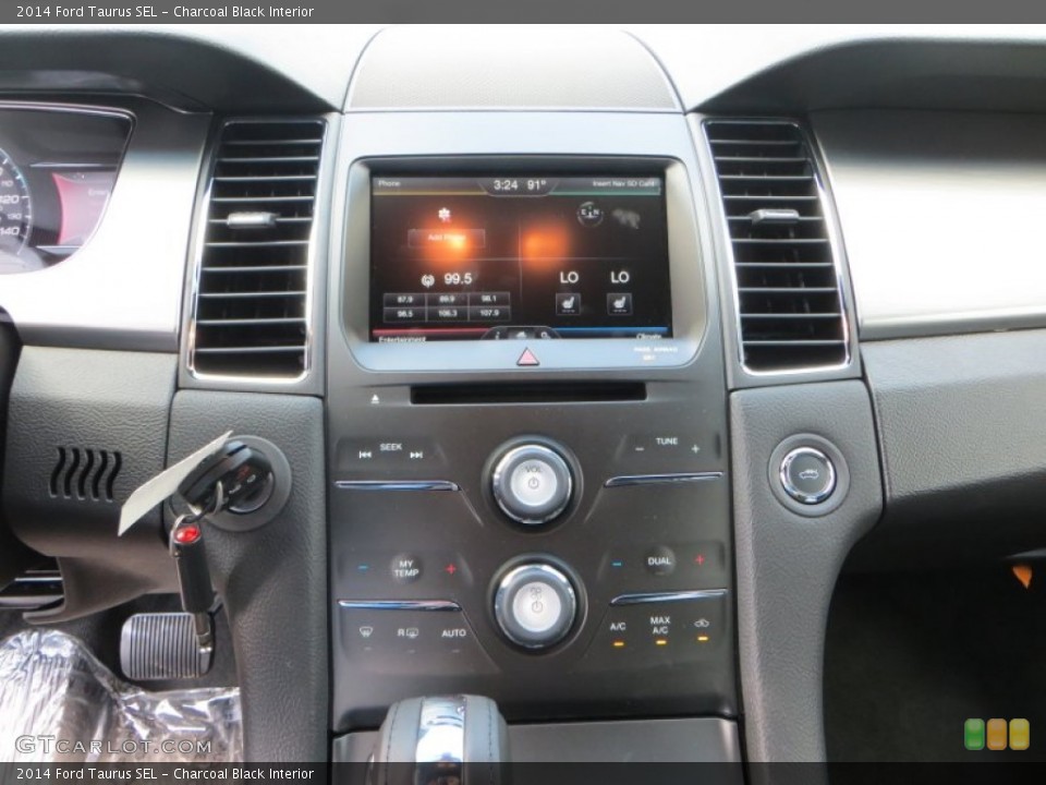 Charcoal Black Interior Controls for the 2014 Ford Taurus SEL #84437053