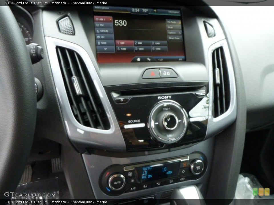 Charcoal Black Interior Controls for the 2014 Ford Focus Titanium Hatchback #84461757