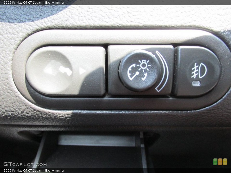 Ebony Interior Controls for the 2006 Pontiac G6 GT Sedan #84468395