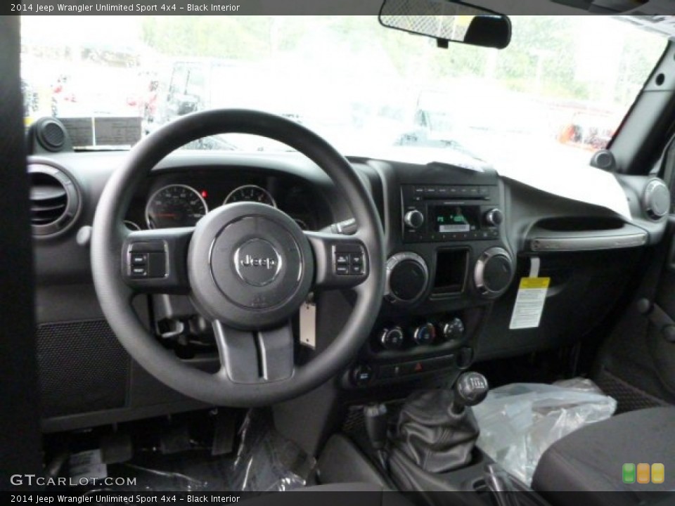 Black Interior Dashboard for the 2014 Jeep Wrangler Unlimited Sport 4x4 #84472094