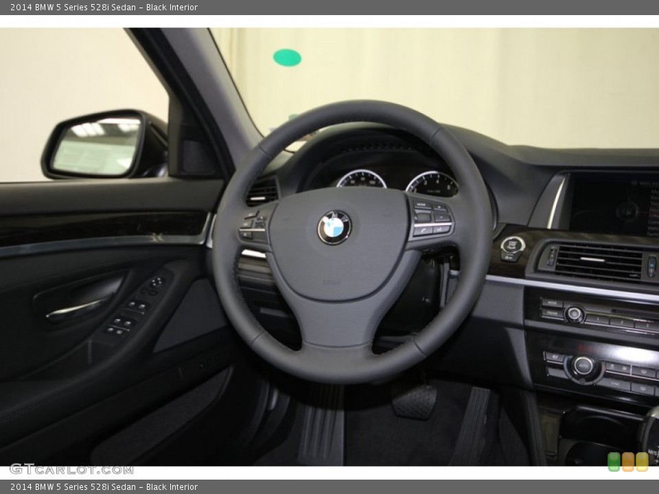 Black Interior Steering Wheel for the 2014 BMW 5 Series 528i Sedan #84522760