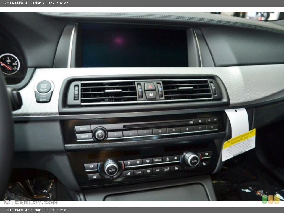 Black Interior Controls for the 2014 BMW M5 Sedan #84558889