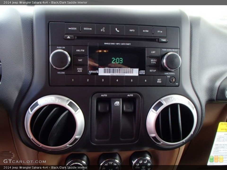 Black/Dark Saddle Interior Audio System for the 2014 Jeep Wrangler Sahara 4x4 #84586126