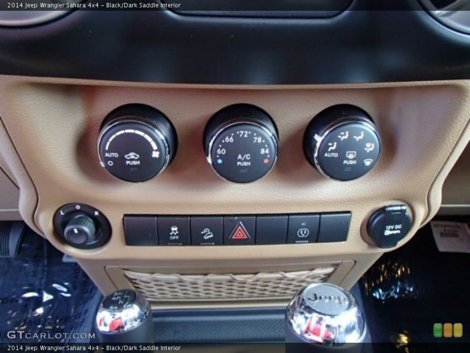 Black/Dark Saddle Interior Controls for the 2014 Jeep Wrangler Sahara 4x4 #84586168