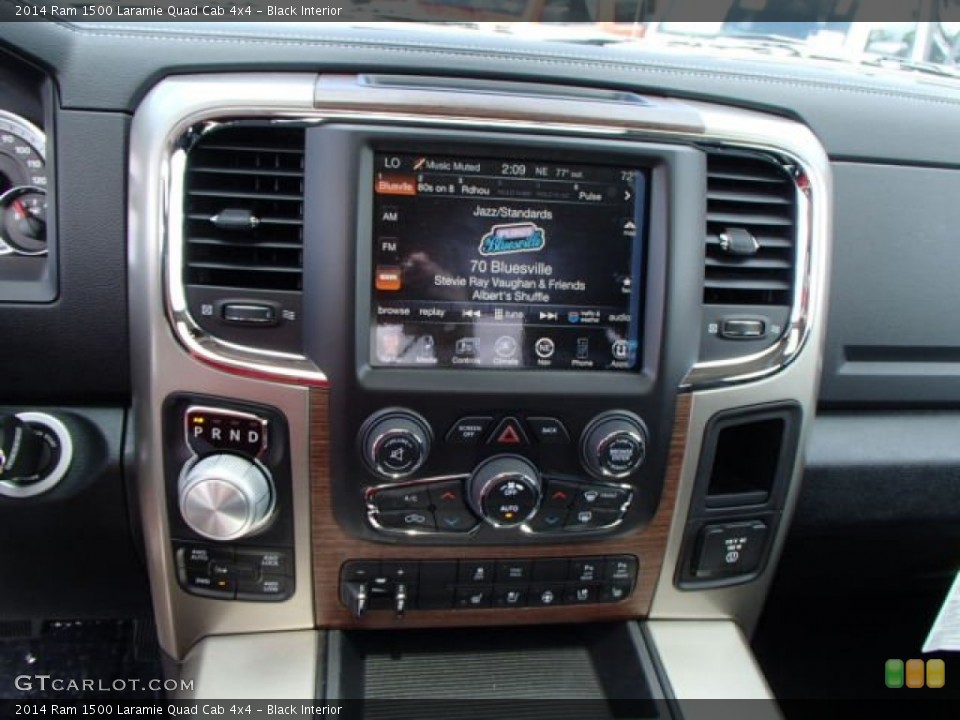 Black Interior Controls for the 2014 Ram 1500 Laramie Quad Cab 4x4 #84589777