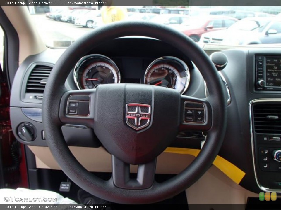 Black/Sandstorm Interior Steering Wheel for the 2014 Dodge Grand Caravan SXT #84590767