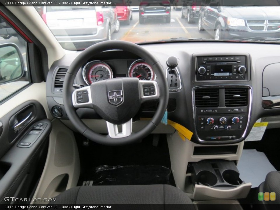 Black/Light Graystone Interior Dashboard for the 2014 Dodge Grand Caravan SE #84597886