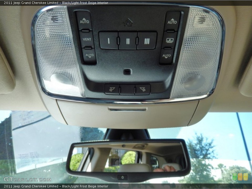 Black/Light Frost Beige Interior Controls for the 2011 Jeep Grand Cherokee Limited #84608038