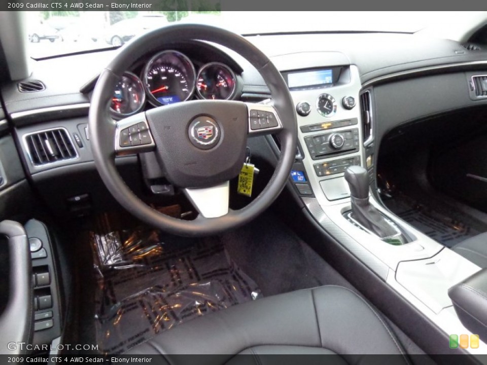 Ebony Interior Dashboard for the 2009 Cadillac CTS 4 AWD Sedan #84626066