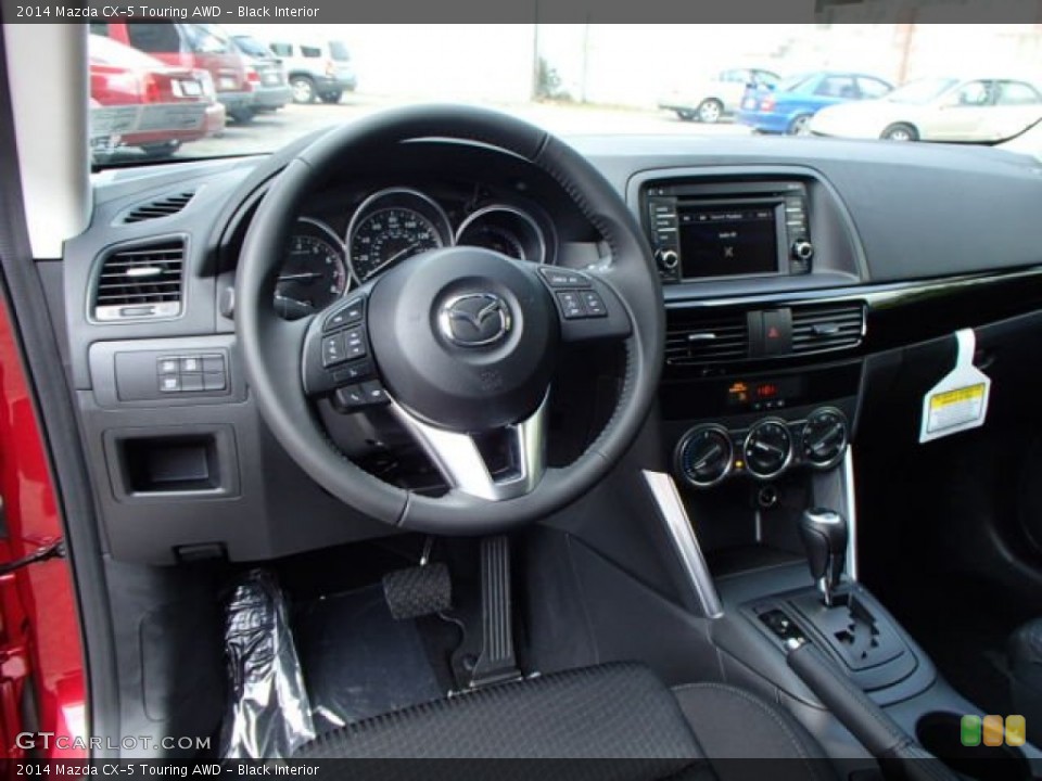 Black Interior Dashboard for the 2014 Mazda CX-5 Touring AWD #84630500