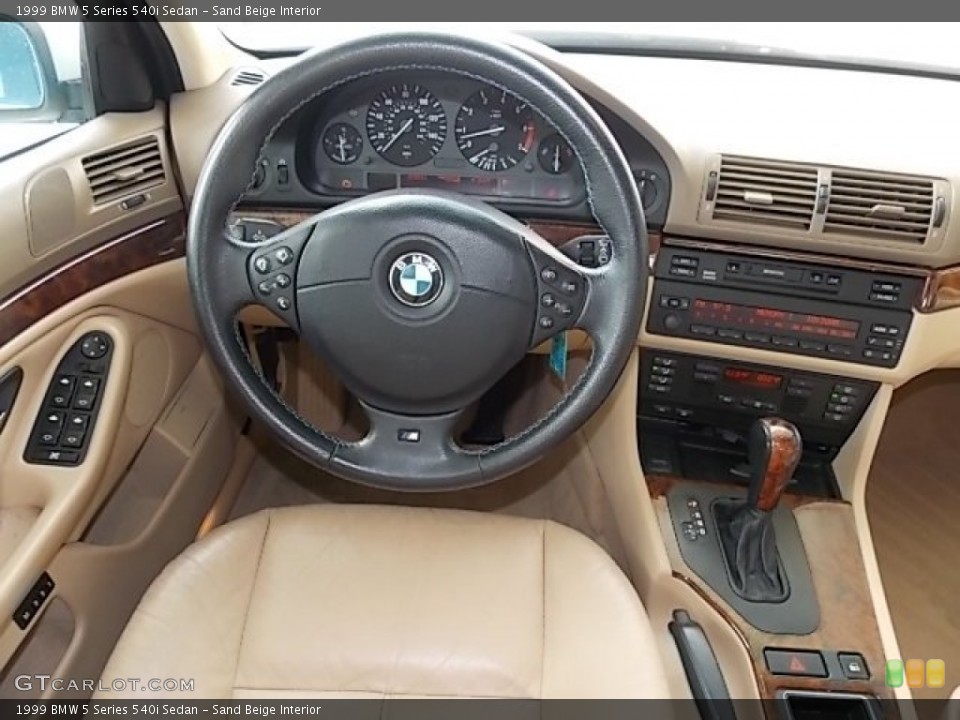 Sand Beige Interior Dashboard for the 1999 BMW 5 Series 540i Sedan #84636434