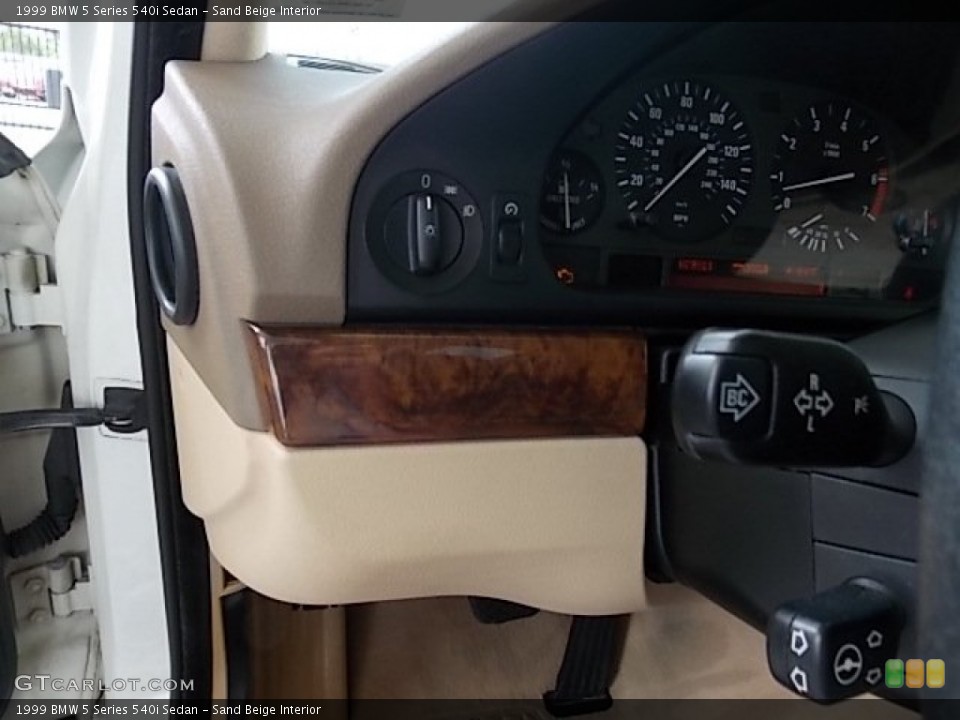 Sand Beige Interior Controls for the 1999 BMW 5 Series 540i Sedan #84636926