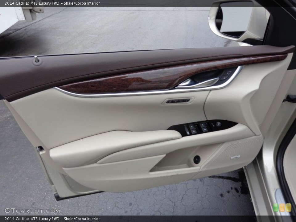Shale/Cocoa Interior Door Panel for the 2014 Cadillac XTS Luxury FWD #84675902