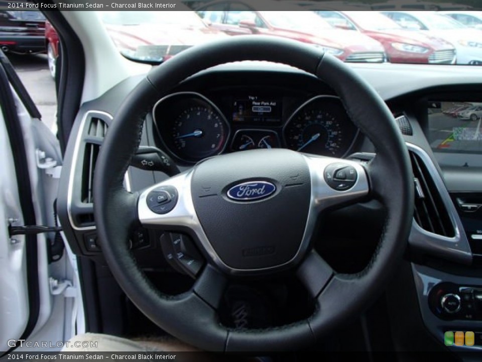 Charcoal Black Interior Steering Wheel for the 2014 Ford Focus Titanium Sedan #84687456
