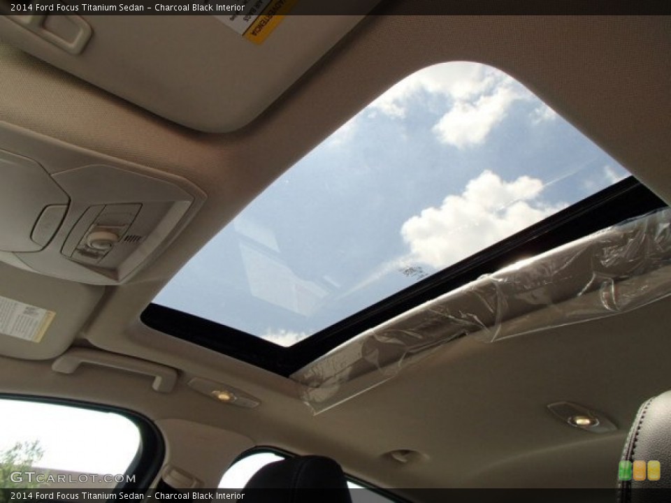 Charcoal Black Interior Sunroof for the 2014 Ford Focus Titanium Sedan #84688058