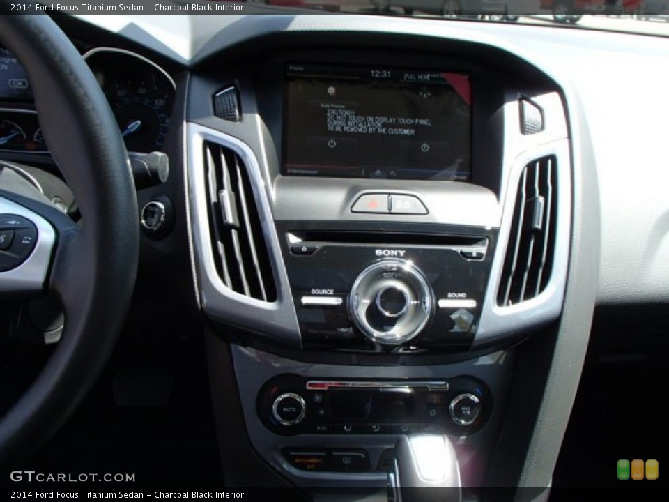 Charcoal Black Interior Controls for the 2014 Ford Focus Titanium Sedan #84688081