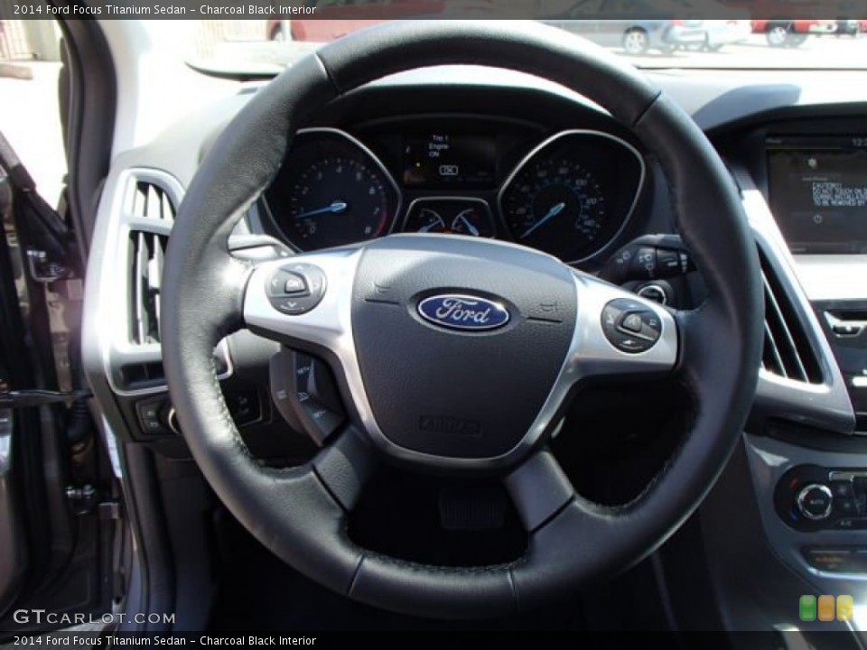 Charcoal Black Interior Steering Wheel for the 2014 Ford Focus Titanium Sedan #84688124