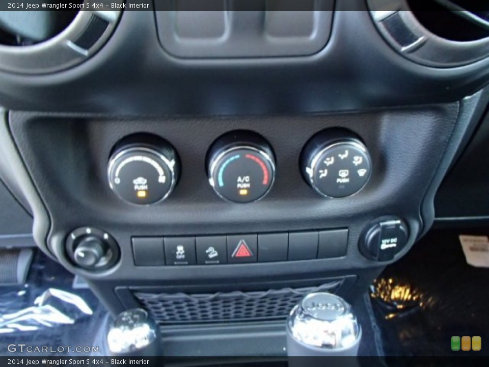 Black Interior Controls for the 2014 Jeep Wrangler Sport S 4x4 #84693287