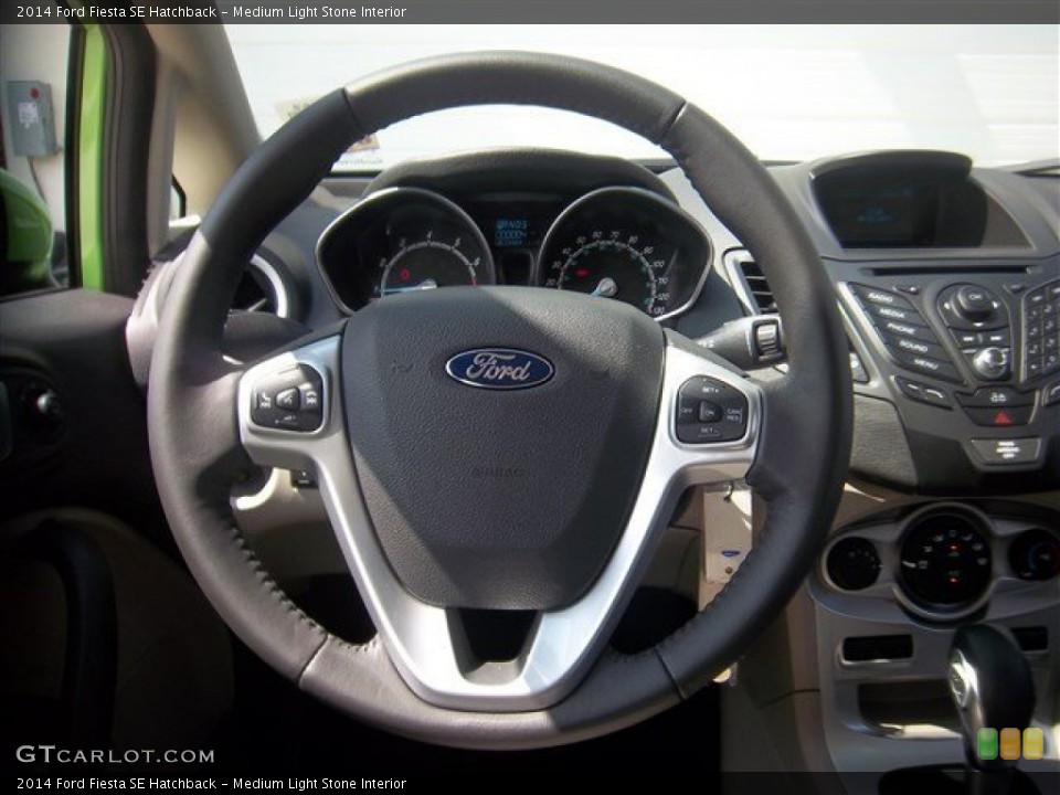 Medium Light Stone Interior Steering Wheel for the 2014 Ford Fiesta SE Hatchback #84726440
