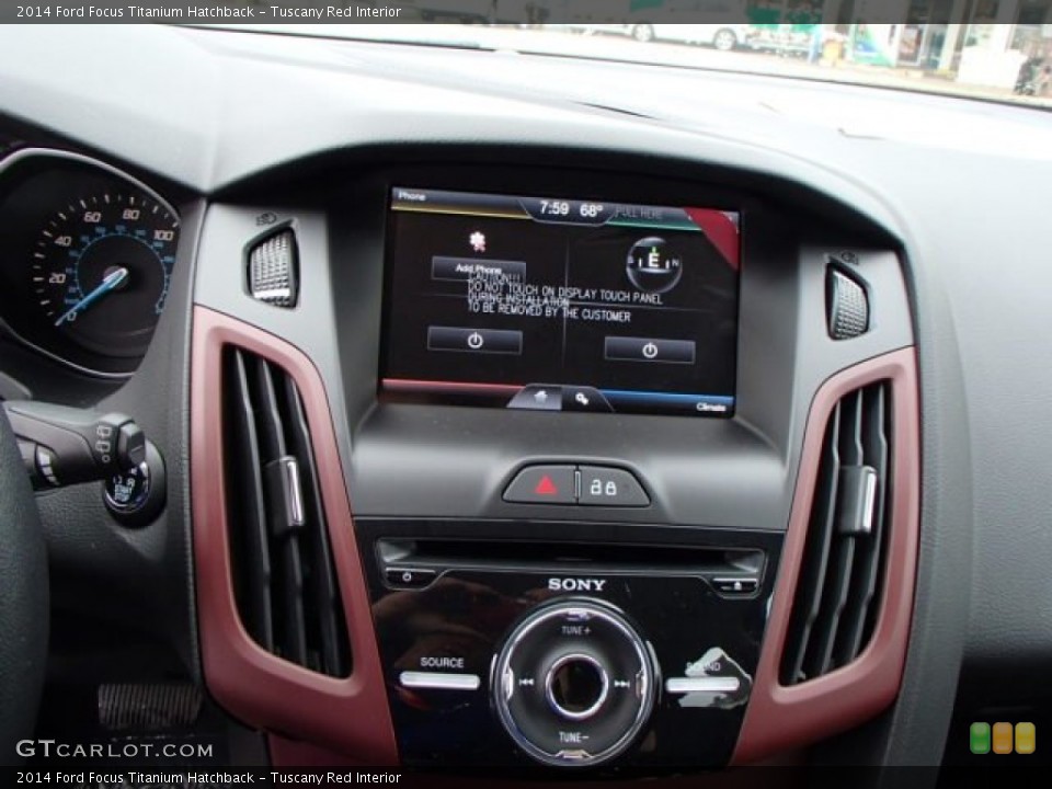 Tuscany Red Interior Controls for the 2014 Ford Focus Titanium Hatchback #84752258