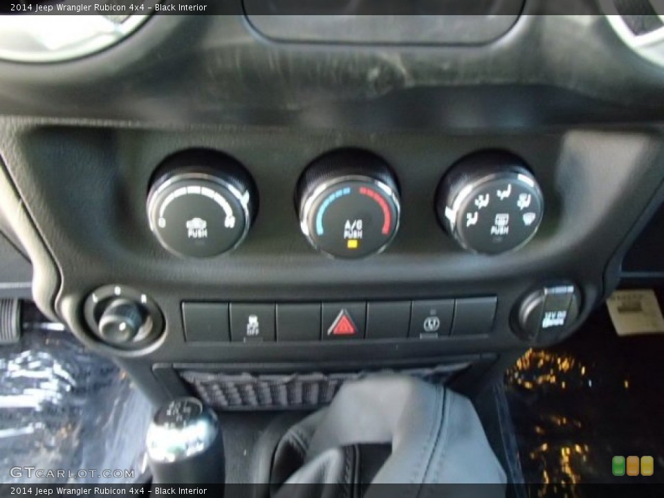 Black Interior Controls for the 2014 Jeep Wrangler Rubicon 4x4 #84768101