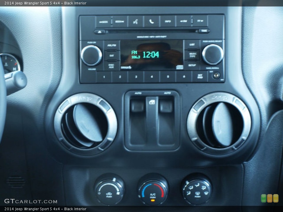 Black Interior Controls for the 2014 Jeep Wrangler Sport S 4x4 #84817584