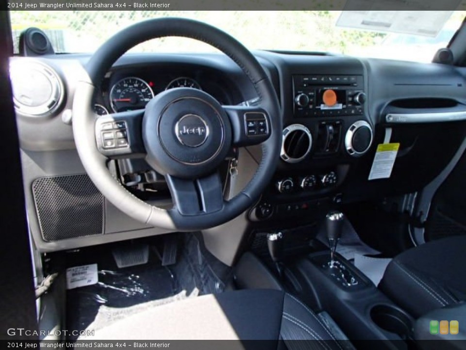Black Interior Dashboard for the 2014 Jeep Wrangler Unlimited Sahara 4x4 #84835791
