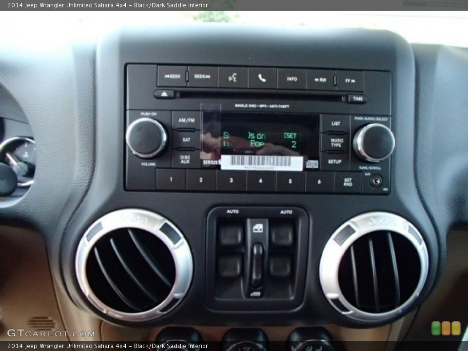 Black/Dark Saddle Interior Controls for the 2014 Jeep Wrangler Unlimited Sahara 4x4 #84837172