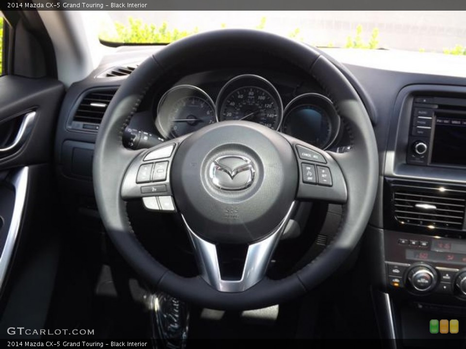 Black Interior Steering Wheel for the 2014 Mazda CX-5 Grand Touring #84848585