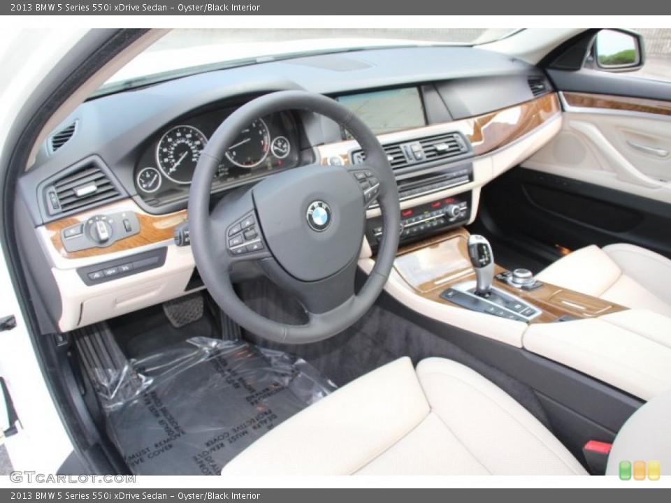 Oyster/Black Interior Photo for the 2013 BMW 5 Series 550i xDrive Sedan #84850253