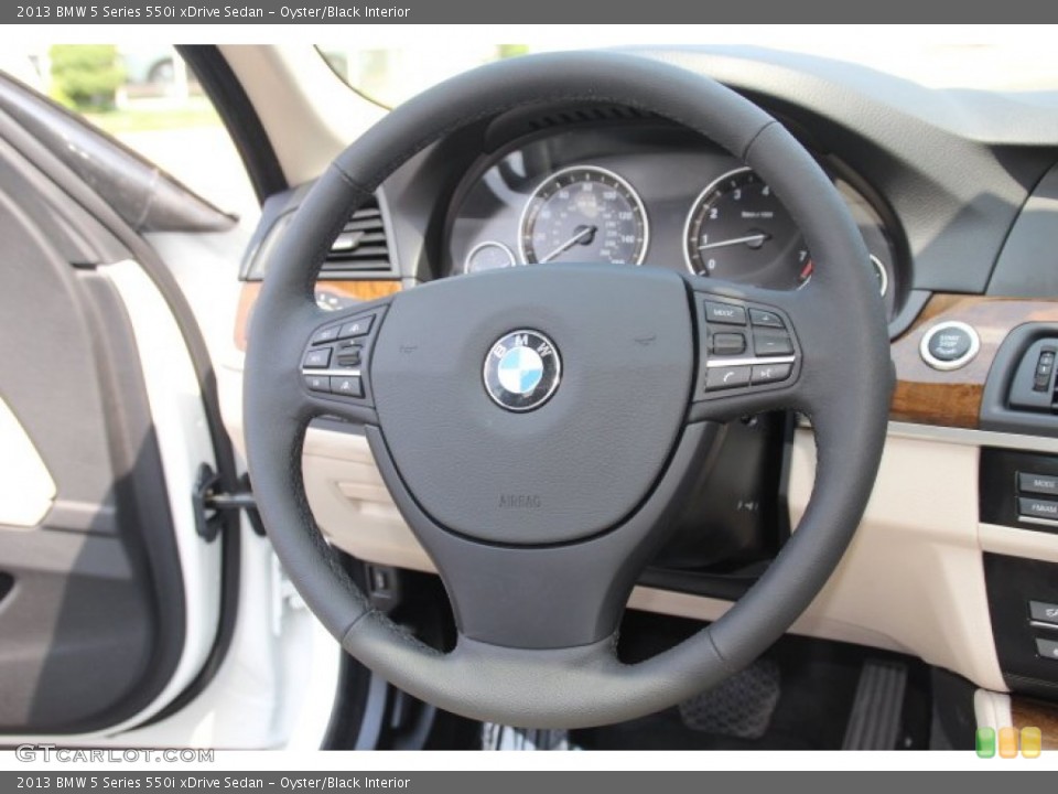 Oyster/Black Interior Steering Wheel for the 2013 BMW 5 Series 550i xDrive Sedan #84850356