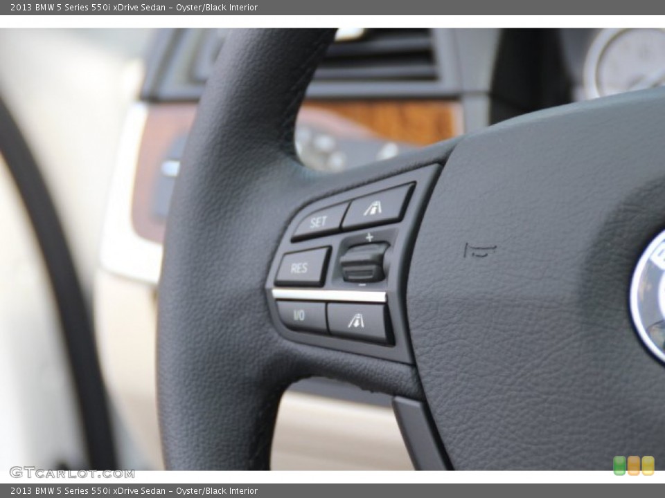 Oyster/Black Interior Controls for the 2013 BMW 5 Series 550i xDrive Sedan #84850374